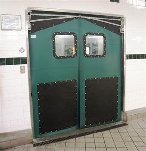 Flexible PVC Swinging Traffic Doors With Impact Plates. Swinging doors for grocery store meat rooms.